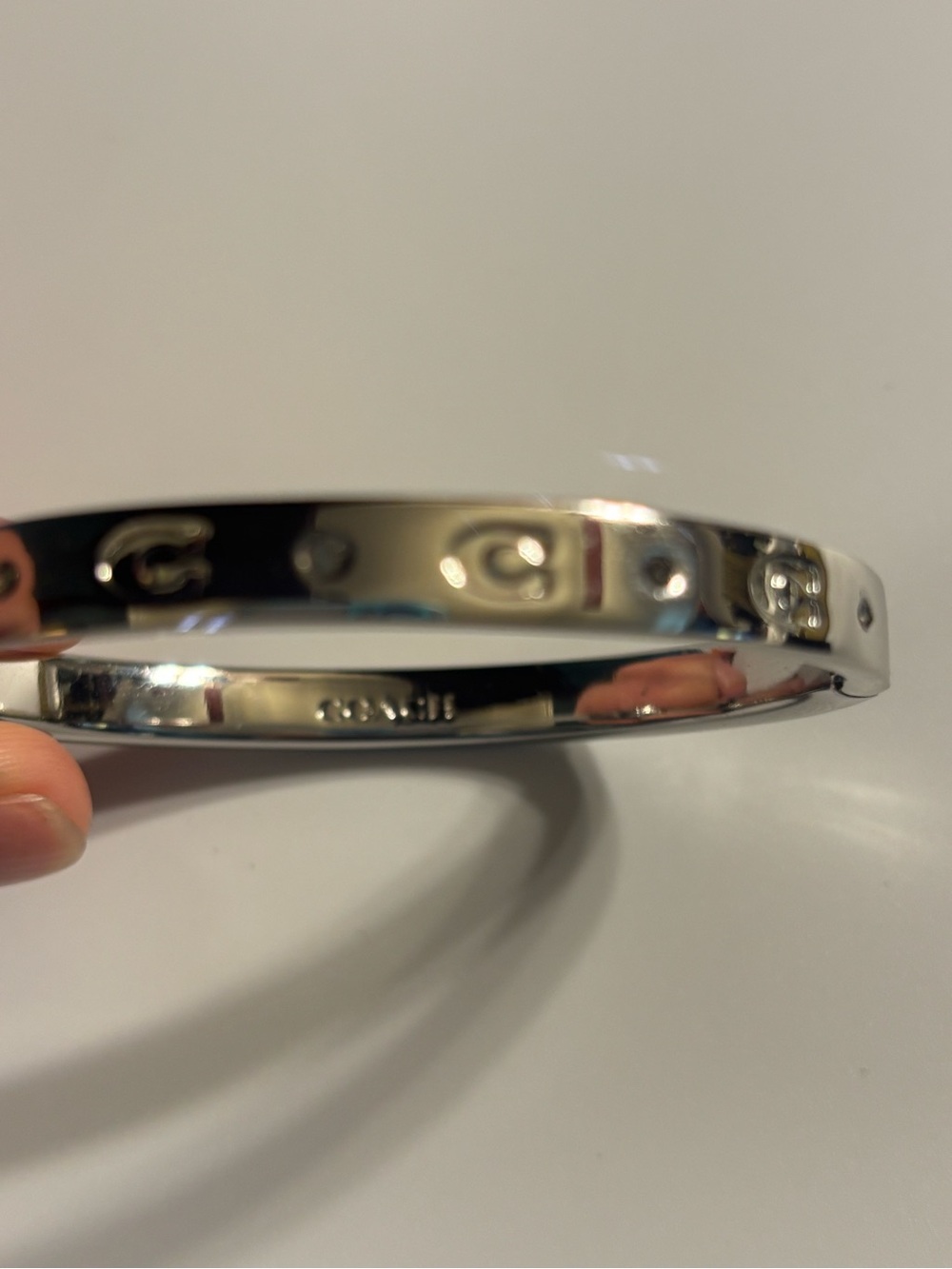 Coach Silver-Tone 3-Piece Necklace, Hoop Earrings & Bangle with Crystal Accents - Picture 6 of 10